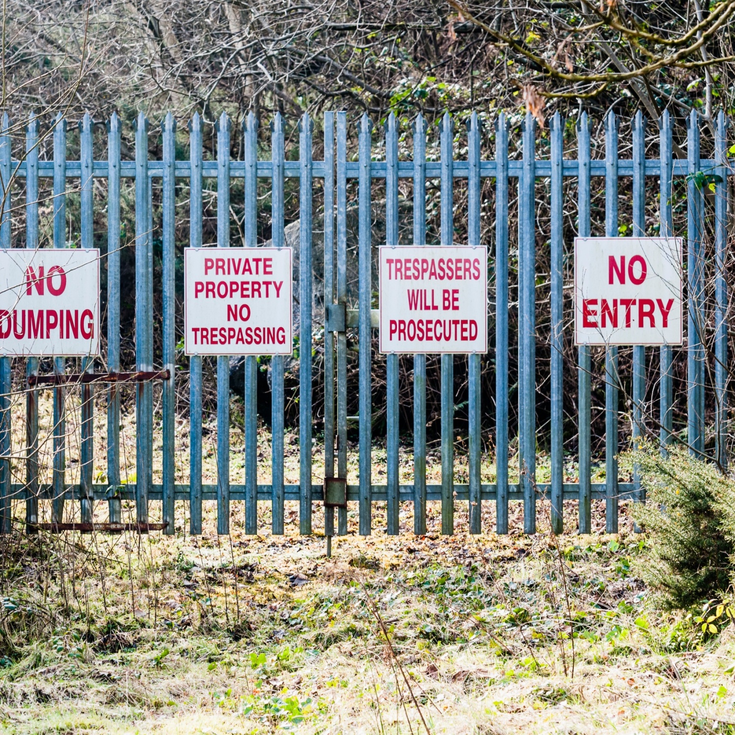 Signs,On,A,Security,Gate,Warning,"no,Dumping",,"private,Property,